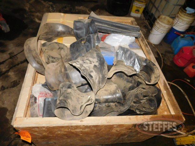 Crate of inner tubes and rim guards_1.jpg